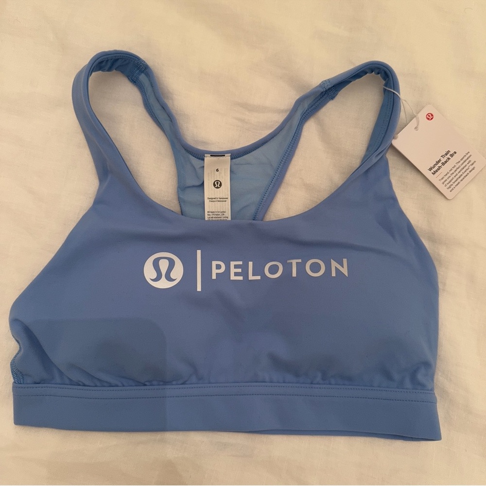 Peloton Light Blue Logo Racerback Sports Bra